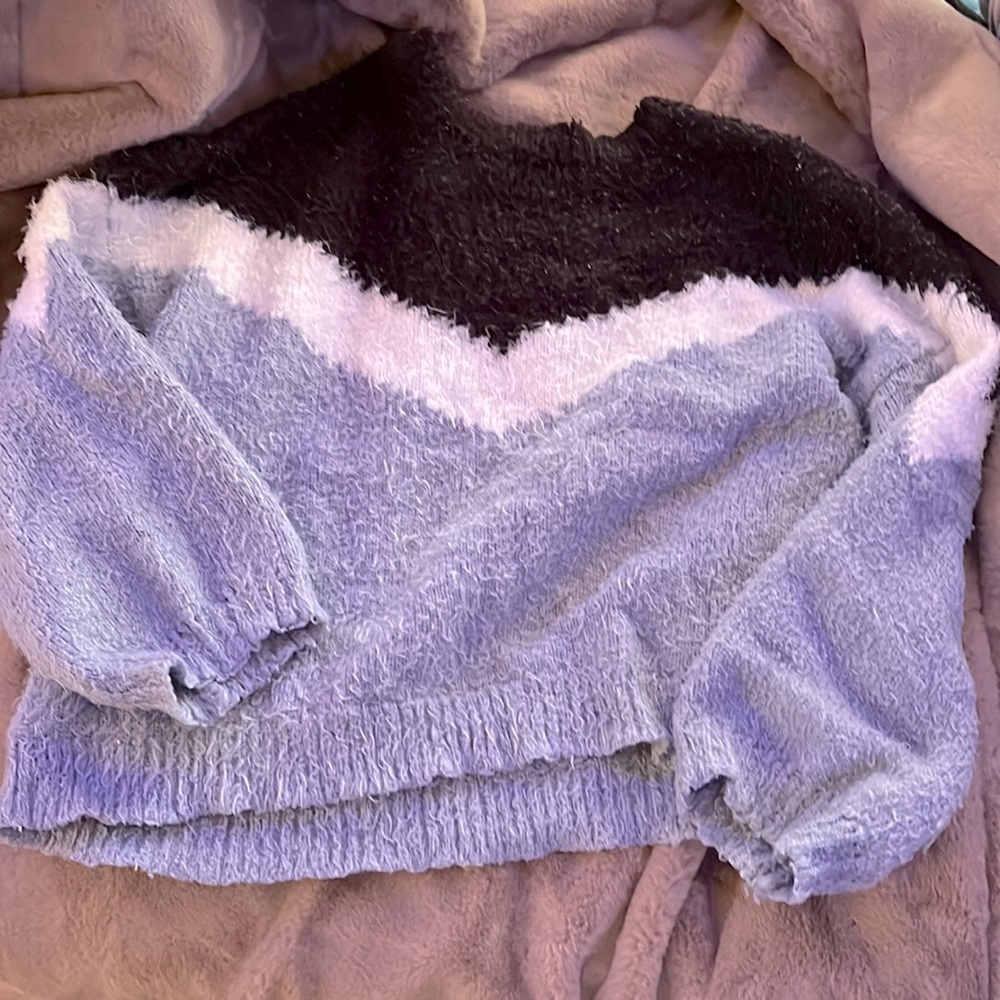 Blue black and white sweater